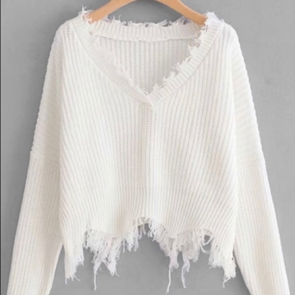 White frayed sweater